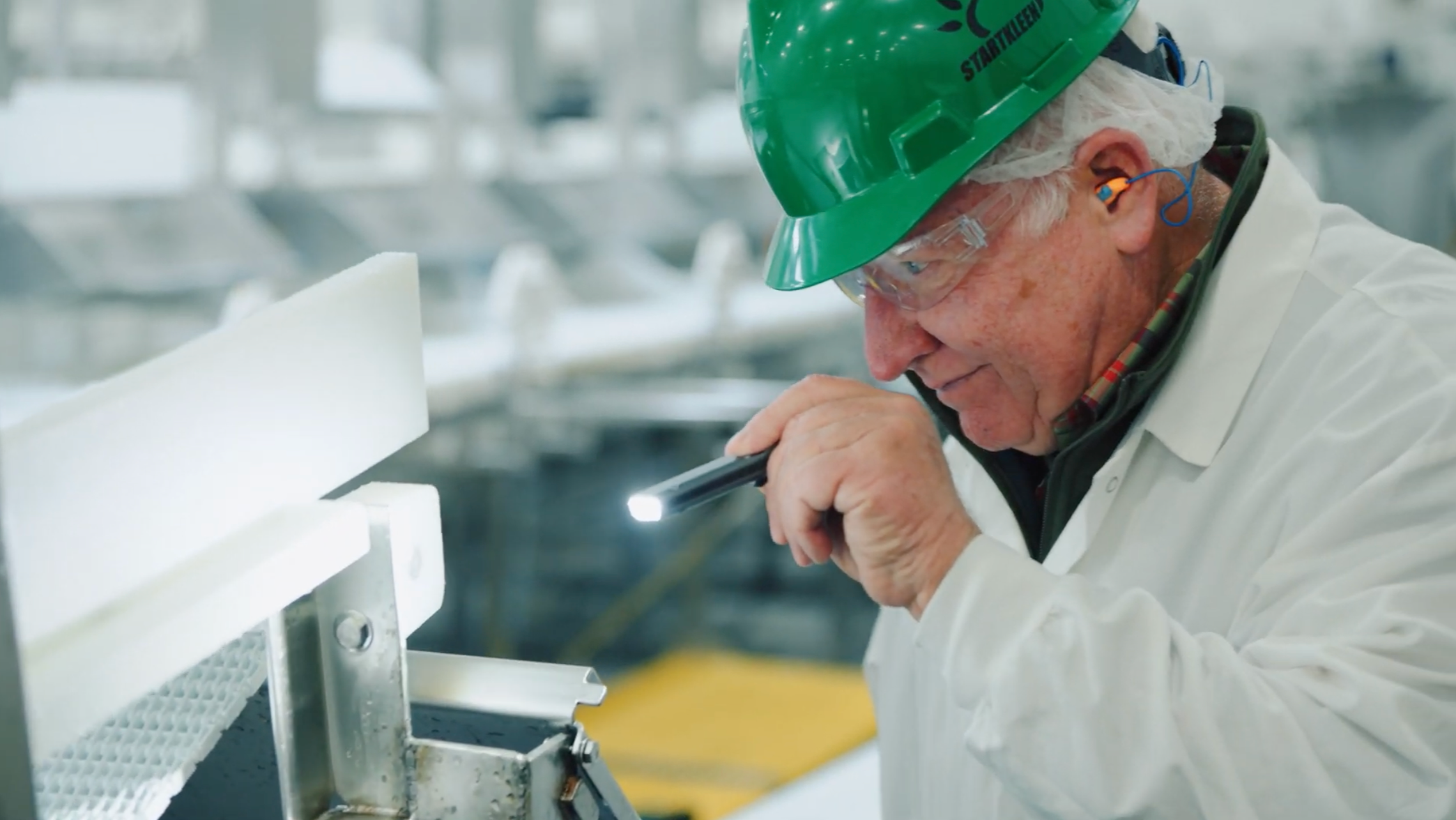 Rick Kimbrell, CEO & Founder of StartKleen, inspecting equipment